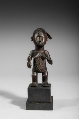an image of a bronze statue of a woman holding a baby