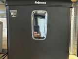 someone is taking a picture of their cell phone in a small refrigerator