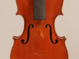 an old violin with a bow on a white background