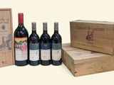 four bottles of wine and a box of wine on the table