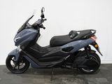 a picture of a motorcycle parked in a garage