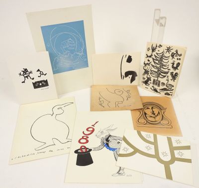 several cards and envelopes of various designs on a white surface