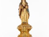 an image of a statue of the virgin mary of guadalupe