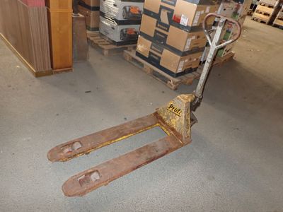 a pallet that is sitting on the floor in a warehouse