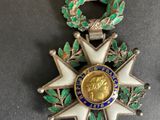 a medal with a star on it on a table