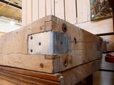 several pieces of wood stacked on top of each other in a room