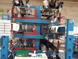 a picture of a machine that is working on a piece of equipment