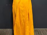 a mannequin mannequin with a yellow skirt on a mannequin mannequin mannequin mannequin mannequin mannequin mann
