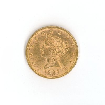 une image d'une pièce d'or sur une surface blanche