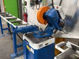 a machine that is working on a piece of metal