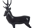 a black statue of a deer on a black base