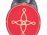 a red box with a gold cross on it