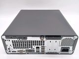 the back view of a computer with a hard drive on top of it