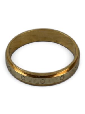 a close up of a gold ring on a white surface