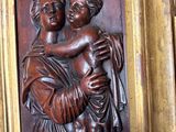 a picture of a statue of a woman holding a child