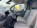 a view of the inside of a vehicle from the driver ' s seat
