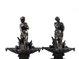 paire de figurines en bronze représentant un garçon et une fille sur une fleur de lotus