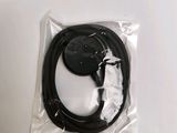 an image of a close up of a black power cord in a bag