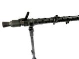 a machine gun on a tripod stand on a white background
