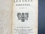 a book with a picture of a coat of arms on it
