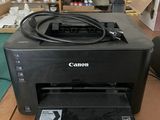 a printer that is sitting on a table in a room