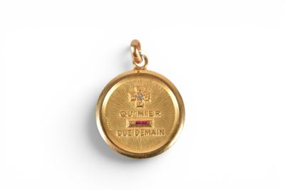 a close up of a gold coin with a crown on it