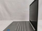 an open laptop computer sitting on top of a white surface