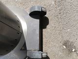 a close up of a metal object on the ground