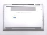 a white laptop computer sitting on top of a white table