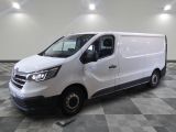 the white van is parked on a checkered tile floor