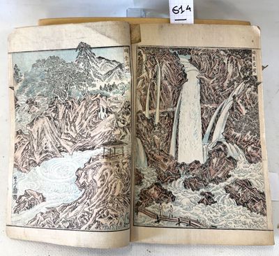 an open book with a drawing of a woman in a white dress