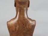 an image of a wooden sculpture of a man ' s head on a white background