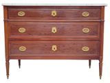 a wooden chest of drawers with a marble top