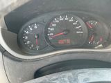 a close up of a car dashboard with a speedometer