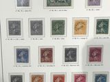 a picture of a framed picture of stamps on display