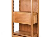 an image of a wooden storage unit with drawers
