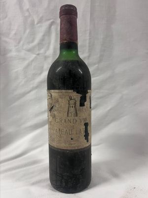 a bottle of wine that is sitting on a table