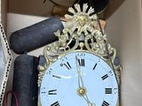 a box with a clock inside of it that is inside of a box