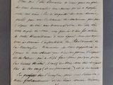 un gros plan d'un morceau de papier sur lequel on a écrit