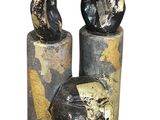 two pieces of art that are sitting on top of each other