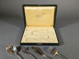 an assortment of silverware including forks, spoons and spoons