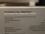 a box that has a picture of a porsche logo on it