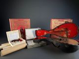a guitar case and other items that are on a table