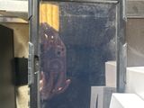 someone is taking a picture of their reflection in a mirror