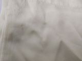a close up of a pair of beige pants with a white background