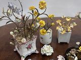 a lot of flowers that are sitting on a table