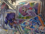a lot of pokemon cards in a plastic bag