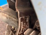 a close up of a motorcycle tire with a blue background