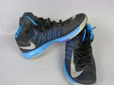 pair of black and blue shoes with blue laces on them
