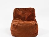 une image représentant un pouf marron sur fond blanc